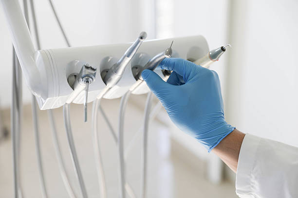 Professional Tooth Extraction technician working in San Carlos, CA
